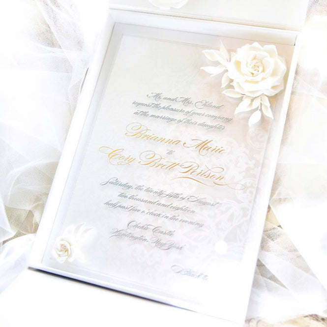 All white floral wedding invitation