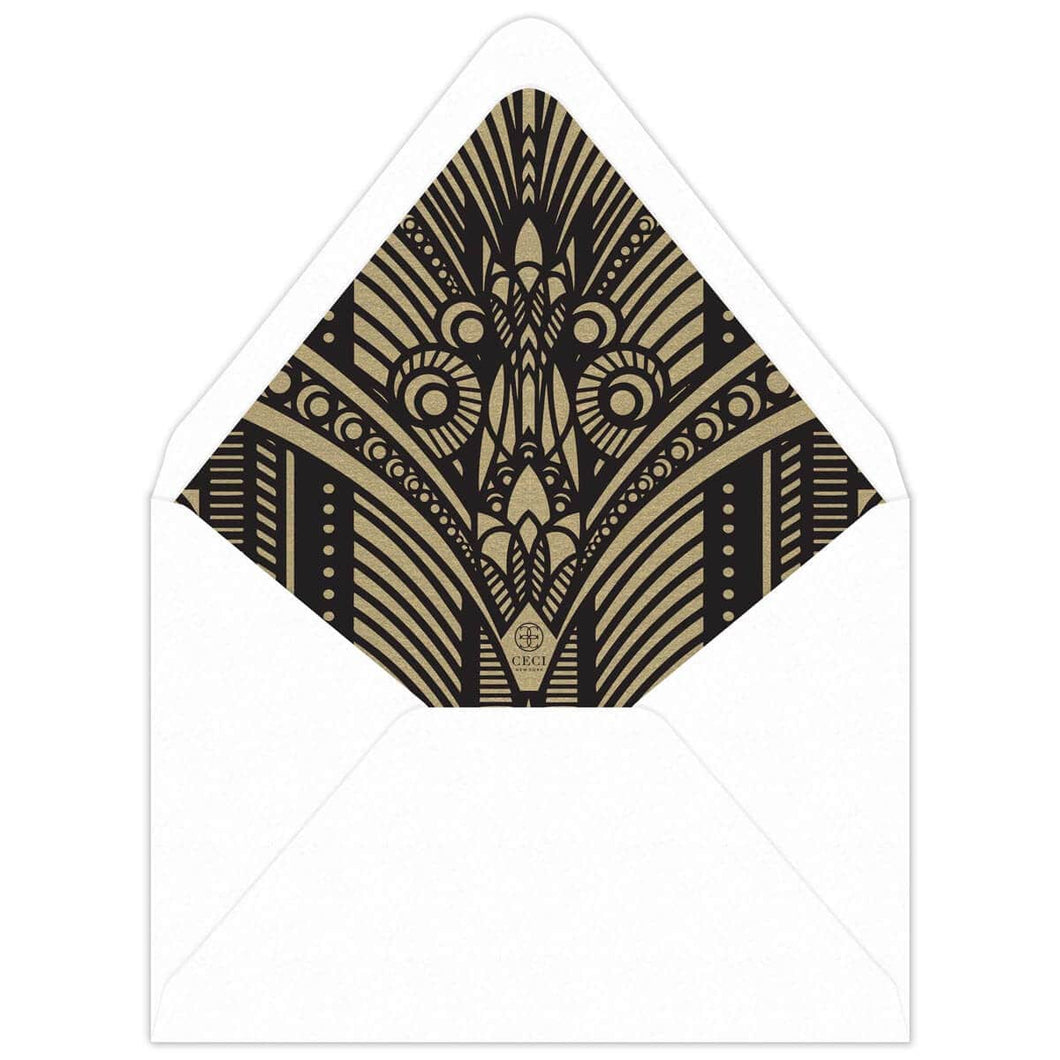 White envelope with gold paper liner and black deco pattern on the liner.