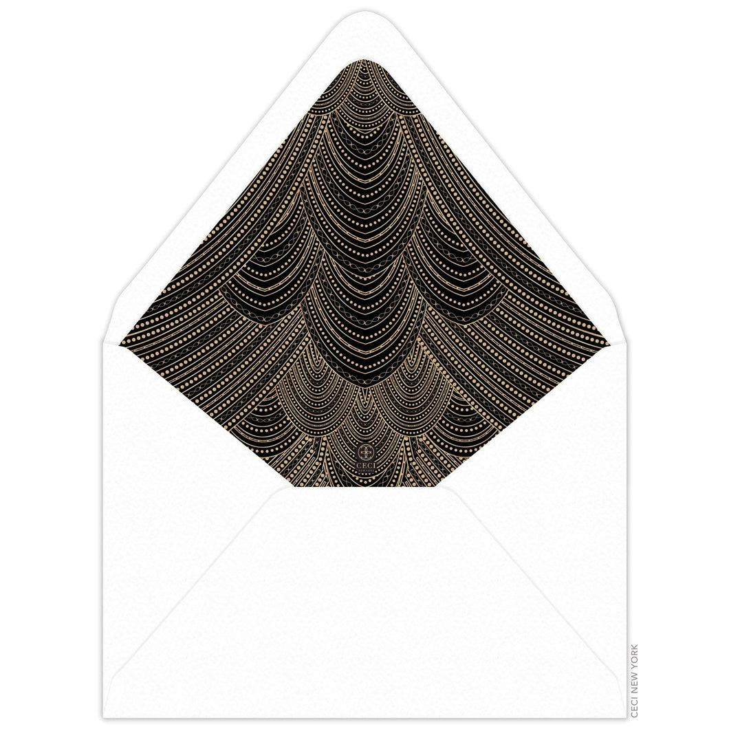 Gold line and dot in sweeping scallop pattern on an envelope liner with black background and white envelope.