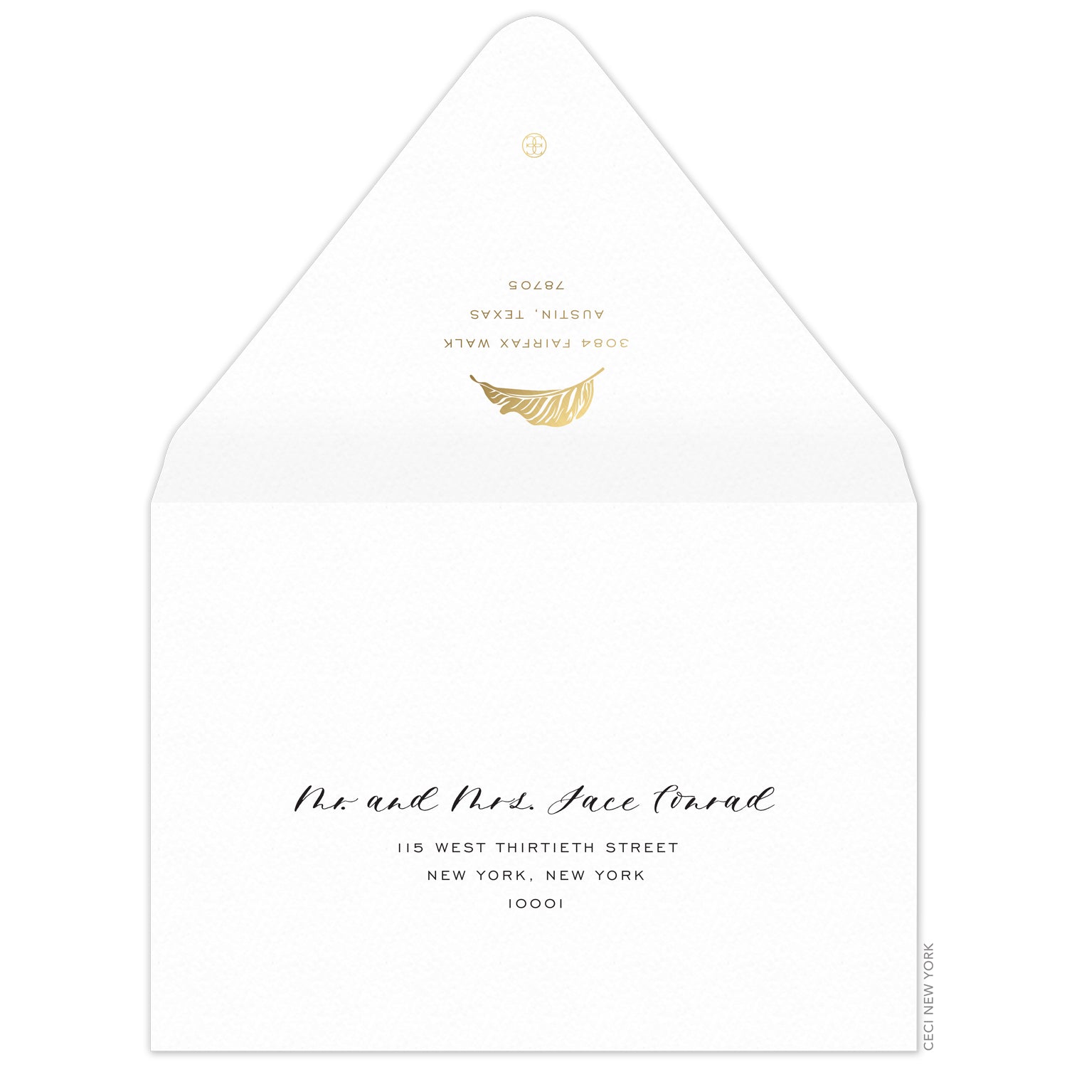 White envelope, san serif return address and modern palm leaf in gold foil on the back flap. Mailing address on the front of the envelope.