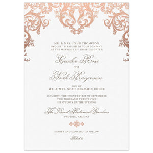 Pink baroque scroll design on the top of the invitation. Grey block and script font centered on the card. Small rose gold flourish separating copy.