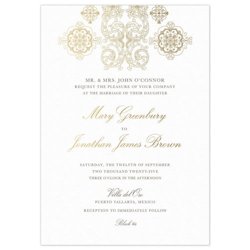white paper invitation with gold mexican design at top and gold script and block font