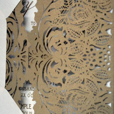 An Intricate Gold Laser-Cut Lace Invitation