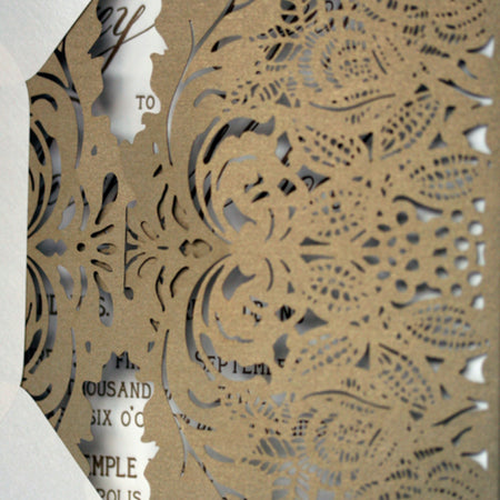 An Intricate Gold Laser-Cut Lace Invitation