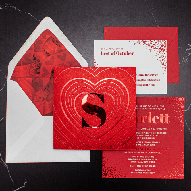 An Iconic Mirrored Bat Mitzvah Invitation With Shimmering Red-Foil Accents