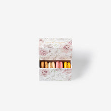 Load image into Gallery viewer, A small floral-patterned gift box containing rows of colorful macarons, centered on a clean white background.