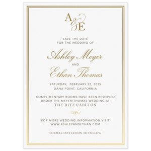 Simple save the date with a double line border. Block pewter and gold script font centered on the page. Block initials and script ampersand monogram at the top of the card.