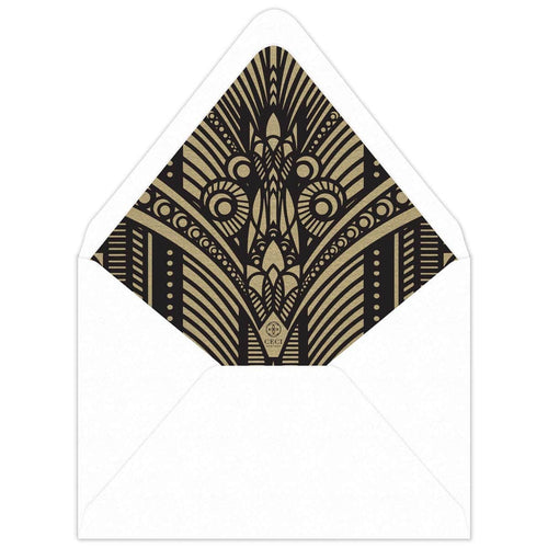 White envelope with gold paper liner and black deco pattern on the liner.