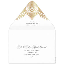 Load image into Gallery viewer, White envelope, gold deco pattern on the tip of the envelope flap. Black san serif return address. Black block and script mailing address on the front of the envelope.