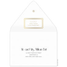 Load image into Gallery viewer, Gold decorative box holding the return address on the back of the envelope flap. Small circle logo on the tip of the flap. Black deco and block copy centered on the front of the envelope.