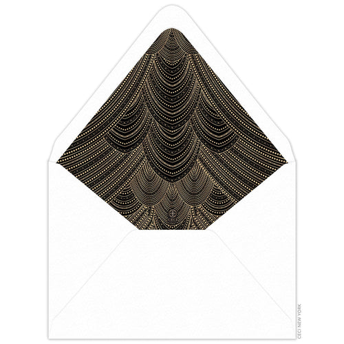 Gold line and dot in sweeping scallop pattern on an envelope liner with black background and white envelope.