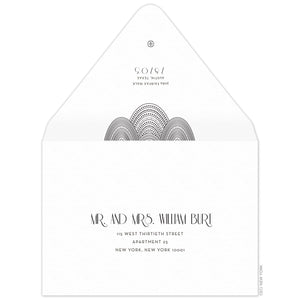 Black lines and dots swooping on the black flap of an envelope. Deco font centered underneath the design with a small circle logo at the top of the flap. Centered deco font on the front of the envelope.