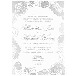 White invitation with lace florals in silver foil on all edges. Block and script font centered on the page.