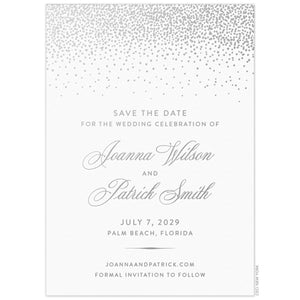 Silver small dots falling from the top of a white invitation. Block and script font centered underneath the dots on the middle of the card.