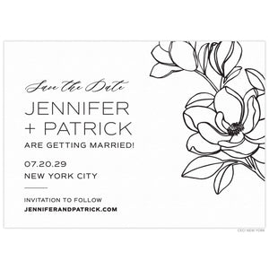 White card with black block and script left aligned copy. Large magnolia flower on the top right and side of the card.