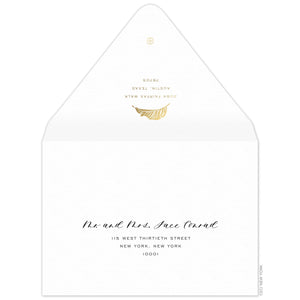 White envelope, san serif return address and modern palm leaf in gold foil on the back flap. Mailing address on the front of the envelope.