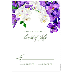White and purple watercolor orchids dripping from the top of a white reply card. Green script and san serif reply copy centered under the flowers.