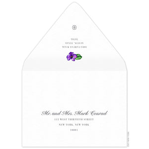 White envelope, serif block return address centered on the back flap, purple watercolor orchid flourish and small ceci new york logo.