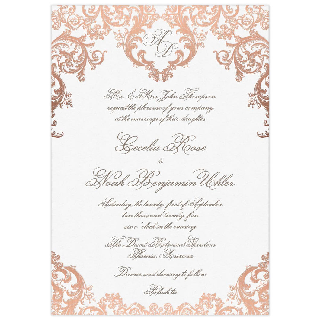 a white paper invitation with baroque rococo rose gold monogram at the top and bottom and dark gray script font