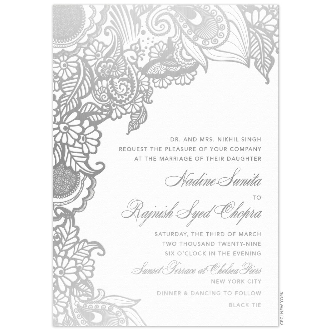 a white paper invitation with silver south asian motif on top and down left side featuring silver script and block lettering