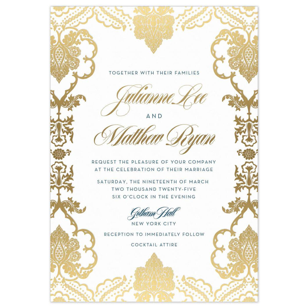 a white paper south asian invitation with gold indian designs on the border with gold script and blue block  font