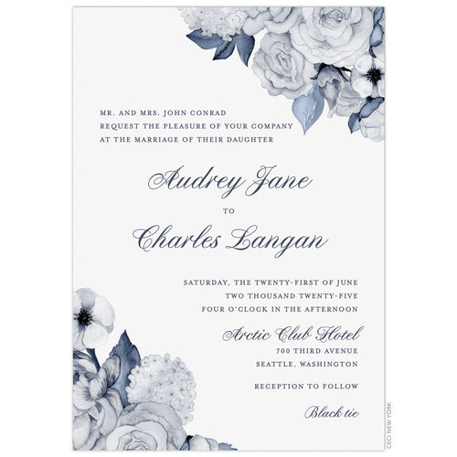 Blue watercolor florals in the top right and bottom left corner. Block and script font centered on the card in navy.